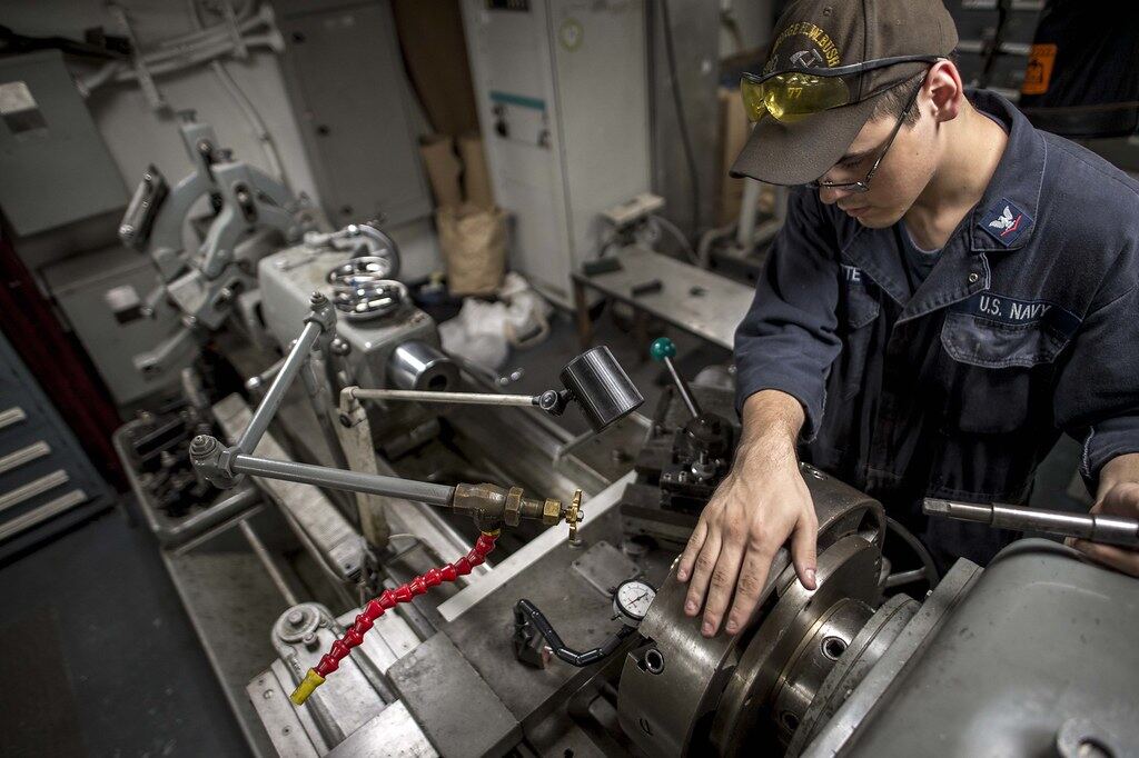 Machinist setting up a turning operation