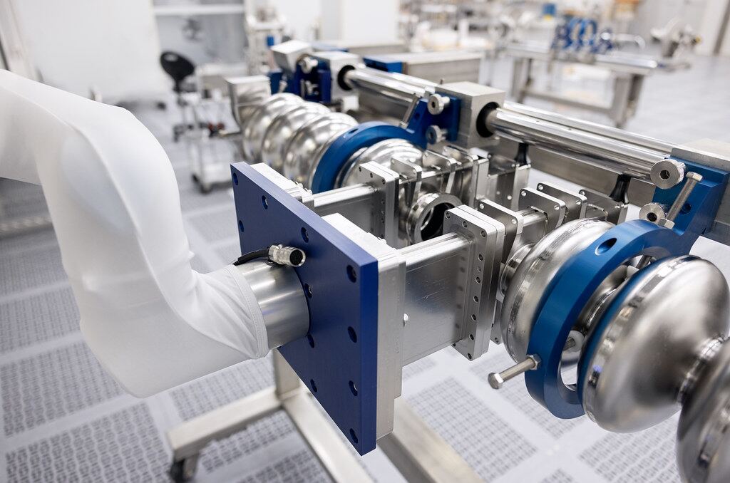 Robotic automation cell handling parts